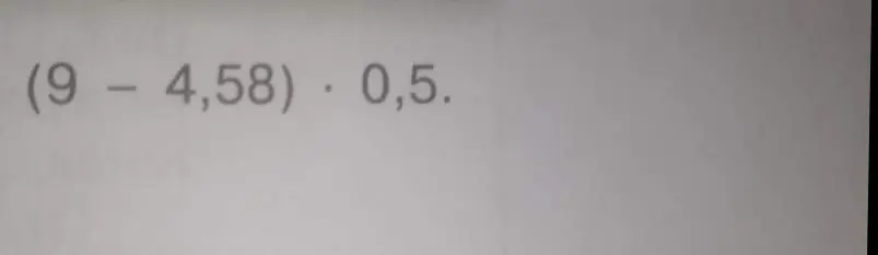 Вычисли значение выражения (9 - 4,58) * 0,5