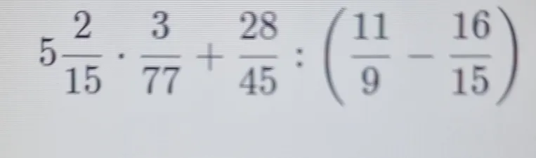 Вычислите значение выражения $5\frac{2}{15} \cdot \frac{3}{77} + \frac{28}{45} : \left( \frac{11}{9} - \frac{16}{15} \right)$