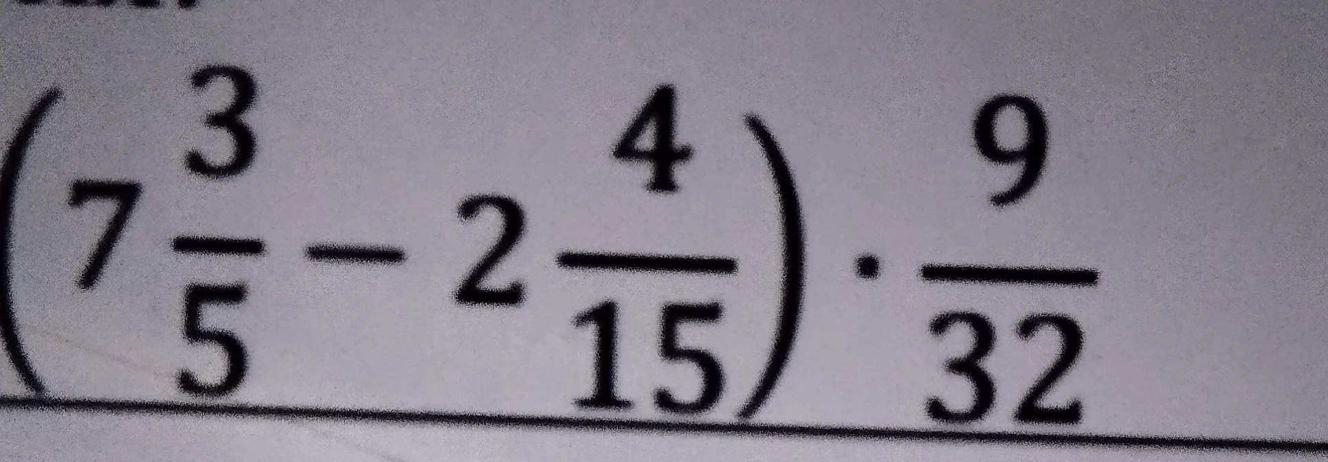 Вычислите значение выражения $(7 \frac{3}{5} - 2 \frac{4}{15}) \cdot \frac{9}{32}$