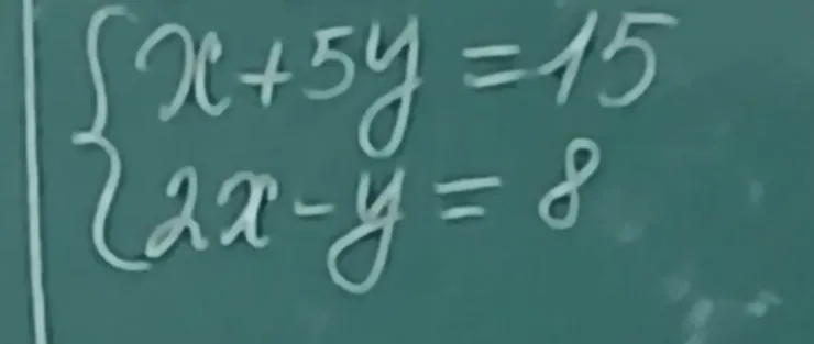 Решите систему уравнений: x + 5y = 15; 2x - y = 8