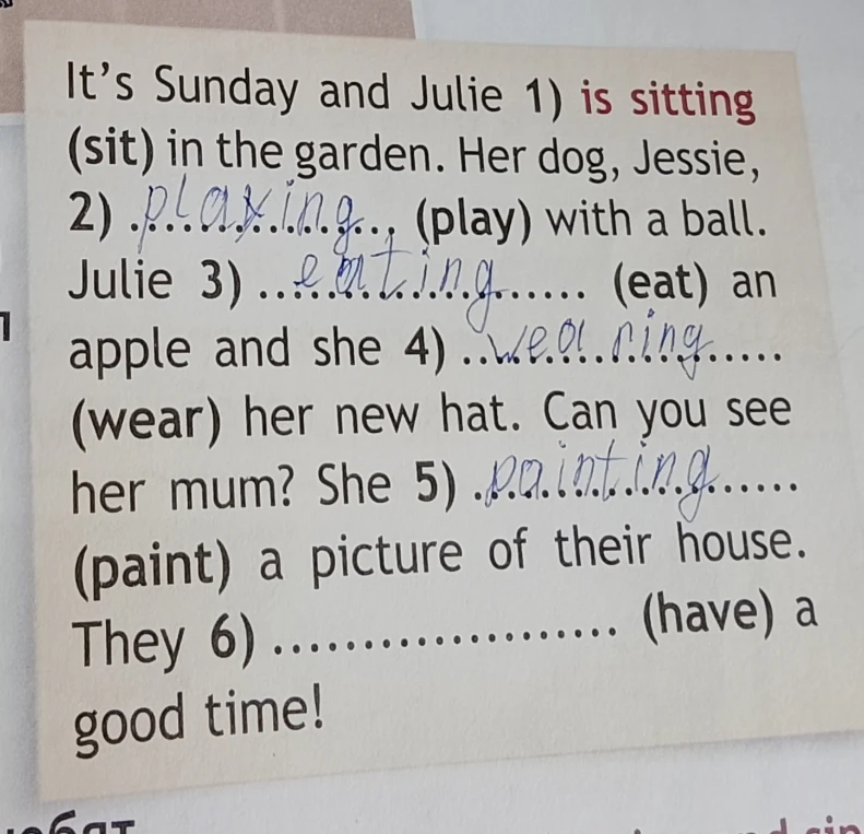 It's Sunday and Julie 1) is sitting (sit) in the garden.