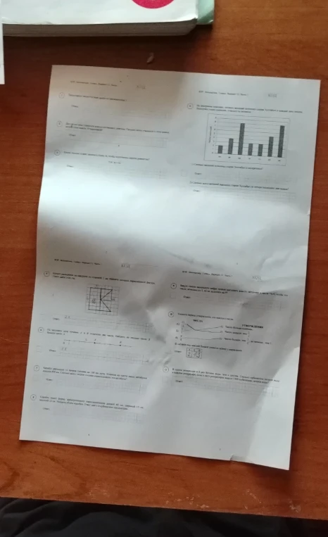 На фотографии представлен лист с контрольной работой, содержащий набор математических задач: задачи на площади, координатные лучи, пропорции и объемы.