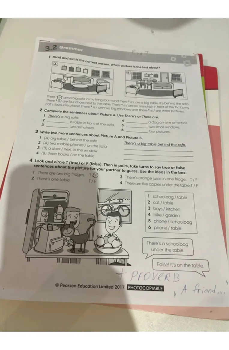 Complete the sentences about Picture A. Use There's or There are.