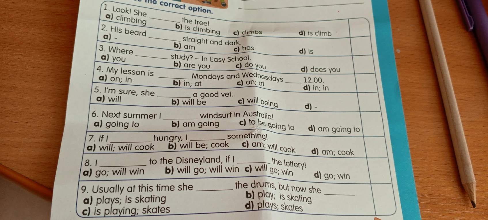 1. Look! She ____ the tree!