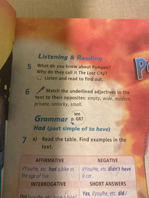 Match the underlined adjectives in the text to their opposites: empty, wide, modern, private, unlucky, small.