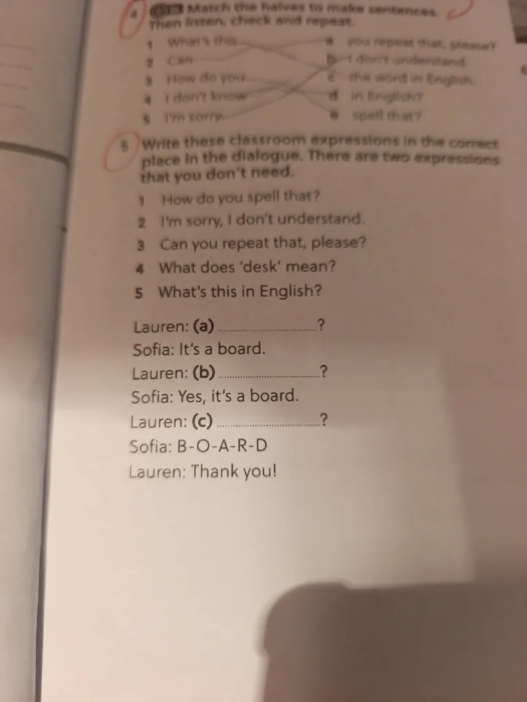 Write these classroom expressions in the correct place in the dialogue. There are two expressions that you don't need.