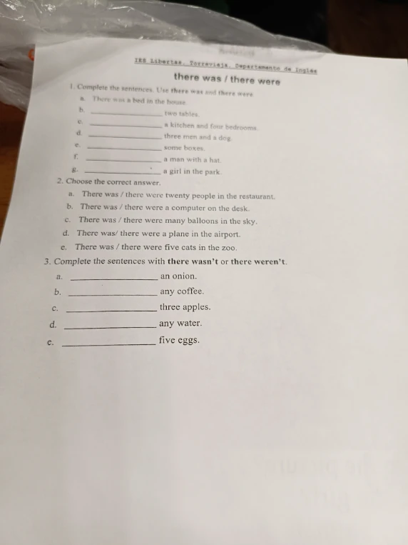 1. Complete the sentences. Use there was and there were