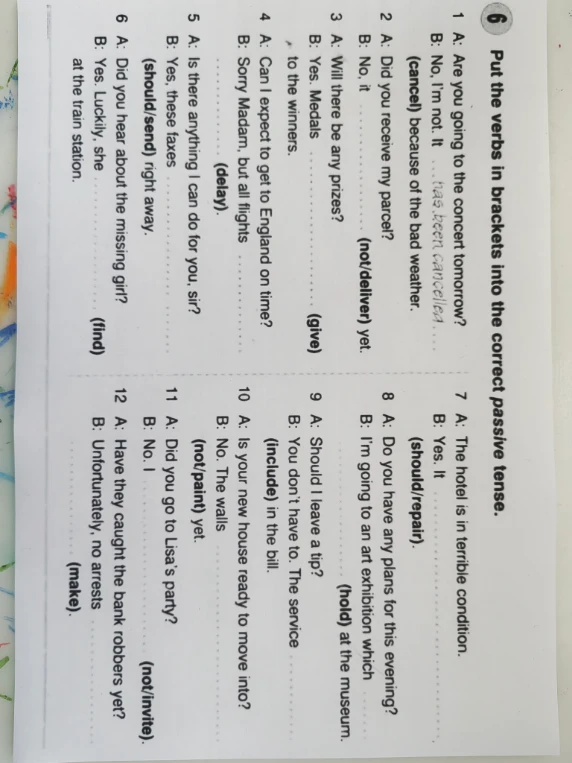 Put the verbs in brackets into the correct passive tense.
