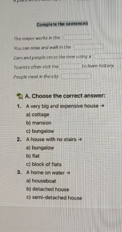 Complete the sentences: The mayor works in the...