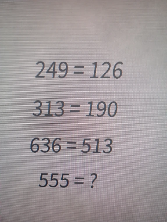 249 = 126, 313 = 190, 636 = 513, 555 = ?