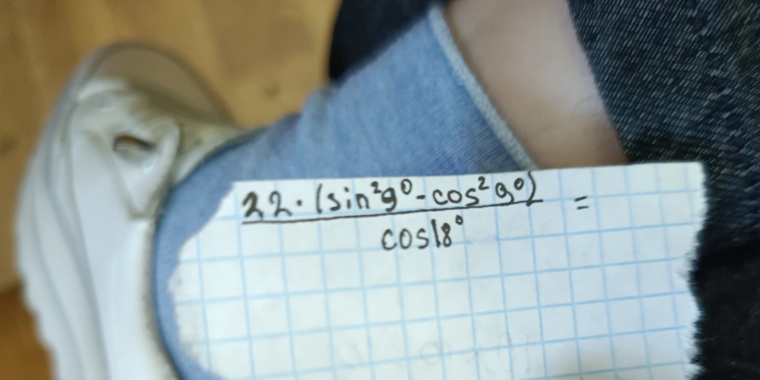 22 * (sin^2 9° - cos^2 9°) / cos 18° =