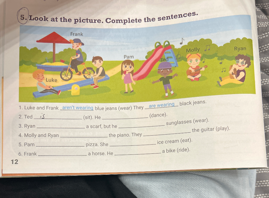 5. Look at the picture. Complete the sentences.