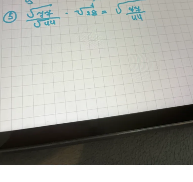 Допущение: выражение записано как (sqrt(77)/sqrt(44)) * sqrt(28) = sqrt((77/44) * 28)