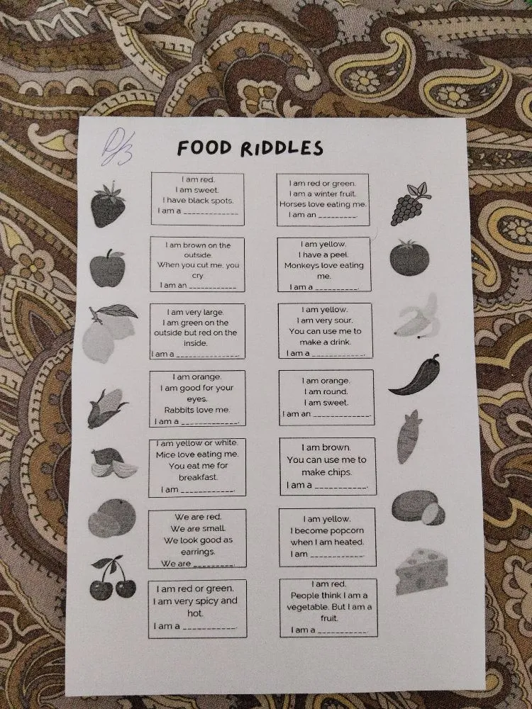 FOOD RIDDLES: I am red. I am sweet. I have black spots. I am a ________.